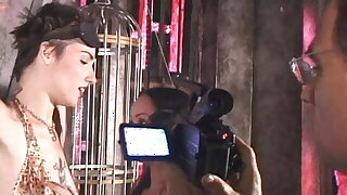 Watch behind the scenes footage of kinky BDSM girls in actio